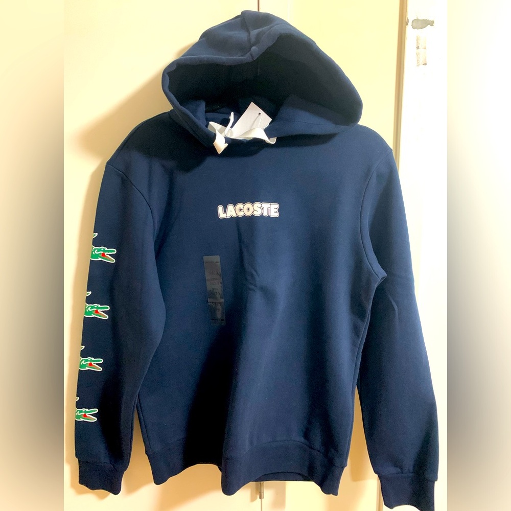 Lacoste sport Navy blue hoodie. NWT mens size small 
Never worn